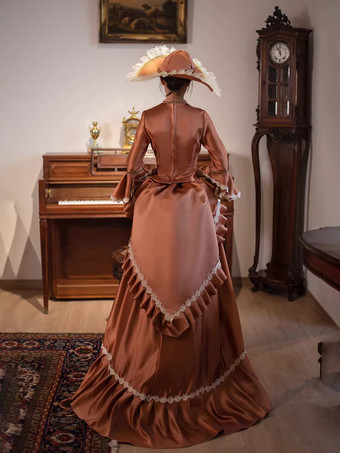 ブラウンのバスル ビクトリアンドレス ロングフレアスリーブ ボールレトロドレス 帽子付き