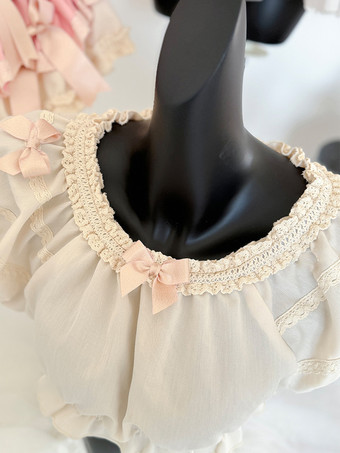 スイートベージュの半袖ポリエステルトップス