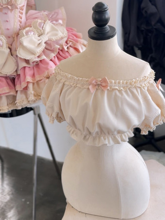 スイートベージュの半袖ポリエステルトップス