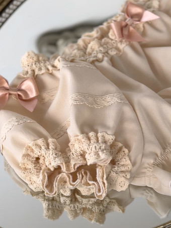 スイートベージュの半袖ポリエステルトップス