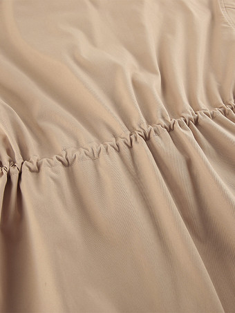 カーキ色のスタンドカラーのレディースウィンドブレーカージャケット - シックなドローストリングウエストのゆったりとしたフィット感 - 実用的なカーゴスタイル 2026年春のストリートウェア