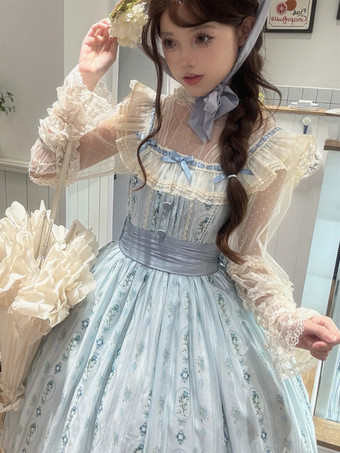 Chemisier Lolita à lettres et carillon éolien en dentelle transparente à pois et à volants.