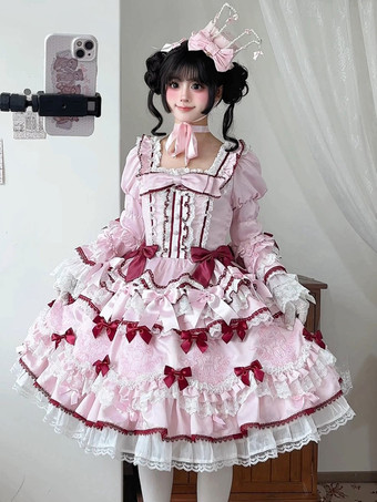 Robe Sweet Lolita rose et blanche à volants et nœud