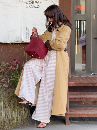 クラシックなロングトレンチコート（レディース） - カーキ色のミニマルなシングルブレストのリラックスフィットダストコート - 春のオフィスからディナーまで活躍するアウターウェア 2026