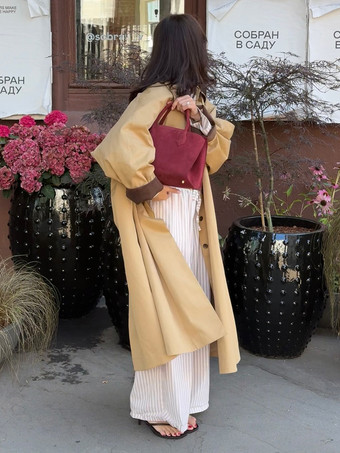 クラシックなロングトレンチコート（レディース） - カーキ色のミニマルなシングルブレストのリラックスフィットダストコート - 春のオフィスからディナーまで活躍するアウターウェア 2026