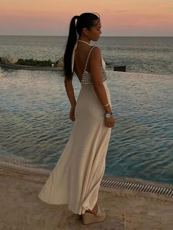 ホルターネックの背中開きマキシドレス（レディース） - スリムフィット、ハイカットスリット、花柄ロゼット付きロングドレス - 2026年夏のビーチバケーション