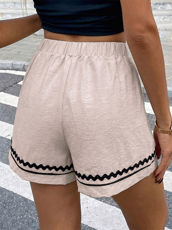 Short beige à taille élastique pour femme avec bordure ondulée noire style décontracté taille haute coupe ample idéal pour l'été.