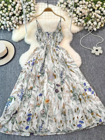ブルー バケーションドレス マキシ丈 バックレス 花柄 ストラップ付き ノースリーブ 花柄プリント ストラップネック シック アプリコットドレス