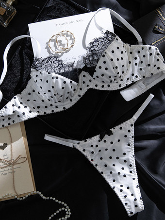 Ensemble soutien-gorge et culotte blancs en dentelle à pois deux pièces.