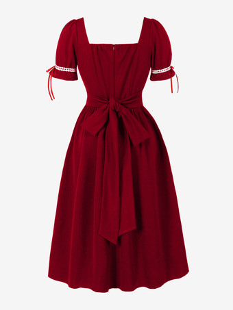 Robe vintage pour femme manches bouffantes coupe midi col carré nœud sur le devant évasée.
