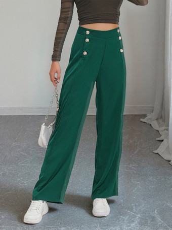 Pantalon de costume taille haute à double boutonnage et jambes larges coupe drapée.