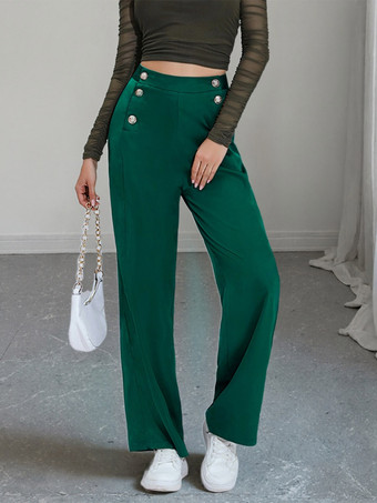 Pantalon de costume taille haute à double boutonnage et jambes larges coupe drapée.