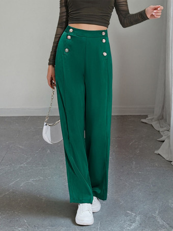 Pantalon de costume taille haute à double boutonnage et jambes larges coupe drapée.