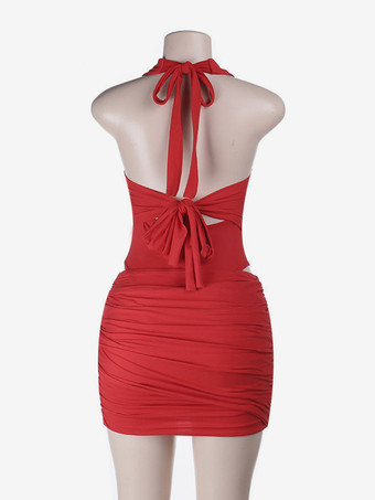 Ensemble deux pièces dos nu à décolleté plongeant mini-jupe froncée nœud dans le dos taille découpée idéal pour les soirées.