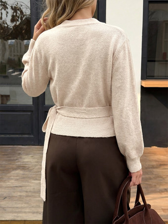 Pull femme couleur abricot clair col en V lacé manches longues style lanterne