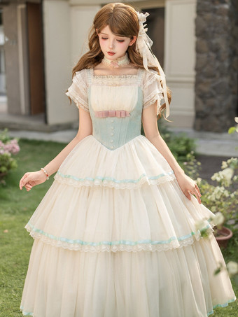 Robe Fairy Lolita vert menthe à corset contrasté robe JSK à bretelles spaghetti et jupe chasuble midi en tulle à volants.