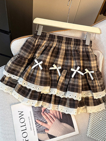 Jupe courte Lolita à carreaux volants et étages ourlet en dentelle et nœud en ruban blanc taille haute.