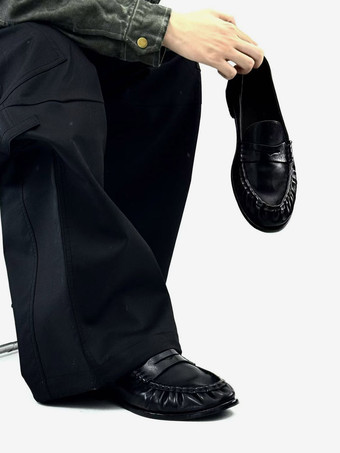Schwarze Penny Loafer mit runder Spitze und Raffung