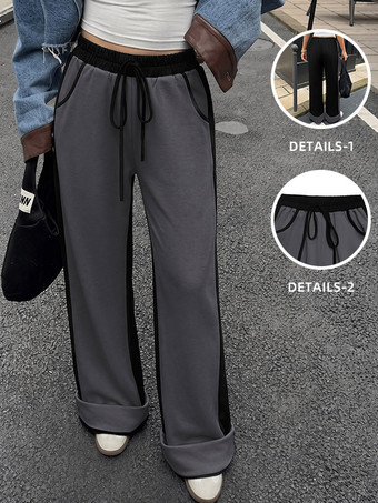 Dunkelgrau Damen-Jogginghose mit Seitenstreifen weitem Bein elastischem Bund Kordelzug lockerer Passform und Taschen