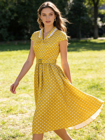 Vintage-Kleid mit Polka-Dots kurzen Ärmeln Spitzenkragen Ziergürtel und Retro-Midi-Schnitt