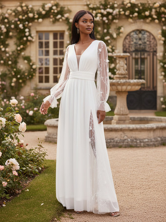 Vestido de novia largo con encaje blanco escote en V profundo y mangas largas transparentes 2026