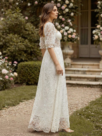 Robe corset longue en dentelle blanche à manches bouffantes et taille transparente 2026