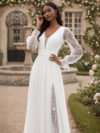 Vestido de novia largo con encaje blanco escote en V profundo y mangas largas transparentes 2026
