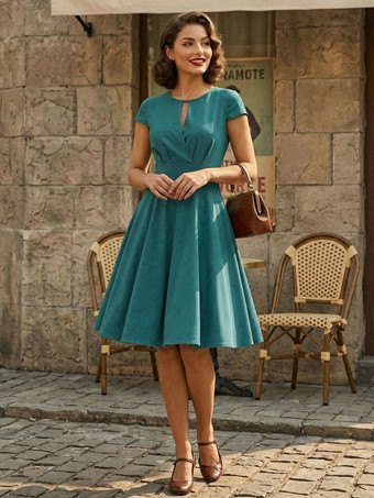 ライトグリーン ヴィンテージドレス　1950年代オードリーヘップバーン風　ジュエルネック　カットアウト　半袖　二次会　お呼ばれ　発表会　ミディアムスイングドレス