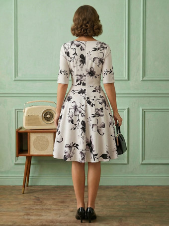 Vestido vintage glamuroso negro estilo años 50 con estampado floral mangas cortas superpuestas escote corazón estilo rockabilly talla mediana.
