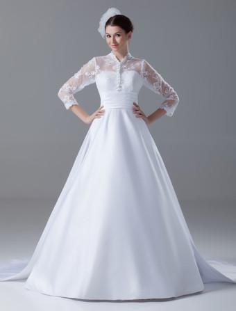 Robe de mariée princesse blanche bustier manche longue à grande traîne zip sur dos