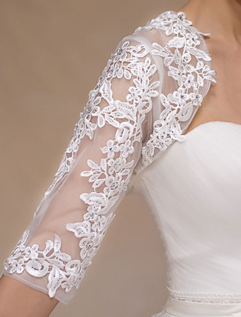 Boléro mariage 2026 en dentelle ivoire ouvert devant